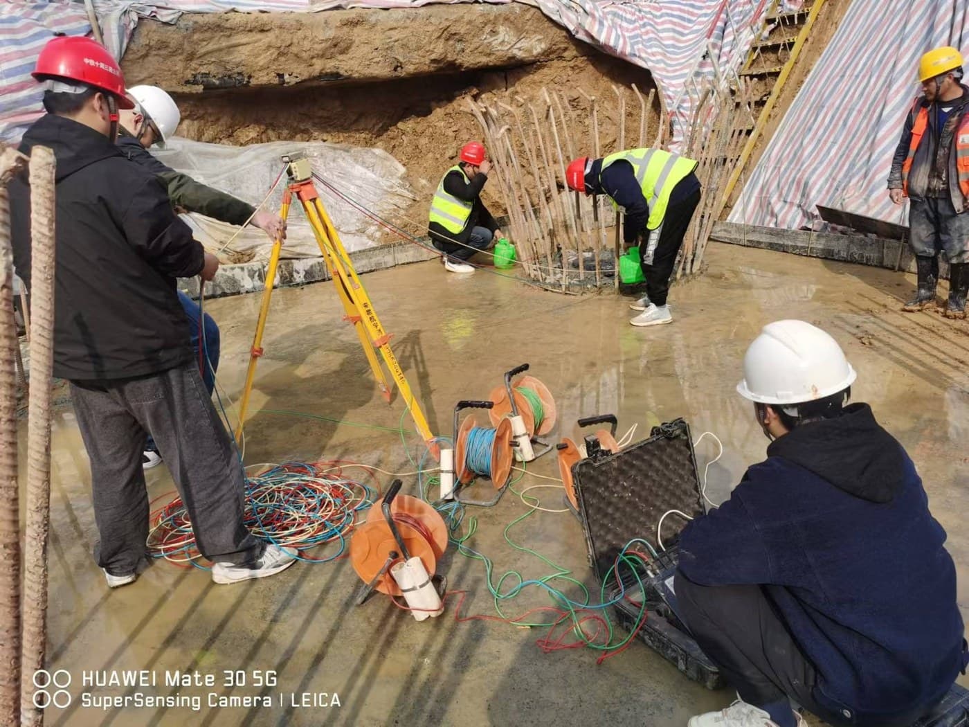 Field pile testing setup with instrumentation and site preparation